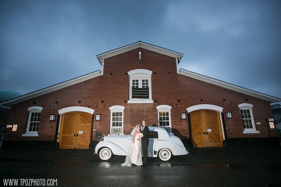 Bride and Groom in front of a Rolls Royce at their Fort Myer Officers Club Wedding