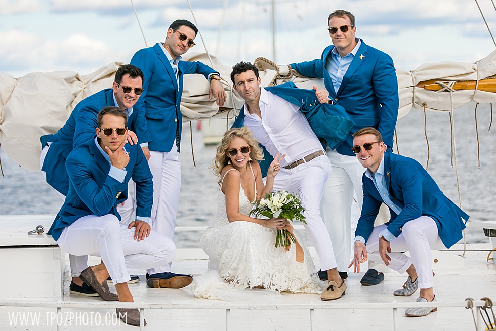Groomsmen on a boat at the Chesapeake Bay Maritime Museum
