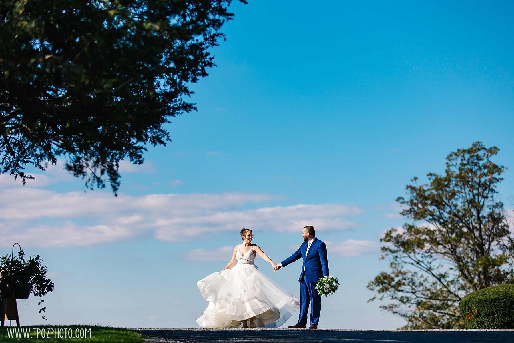 Bride and groom twirling at their Dulany's Overlook wedding